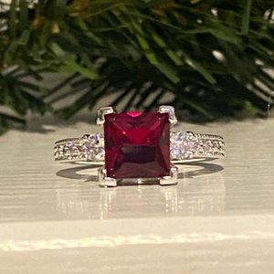 Bomb Party Garnet and White Topaz Ring